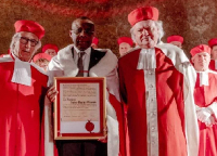 Il se présente comme un chrétien pratiquant qui fut enseigné par Maurice KAMTO à l'IRIC